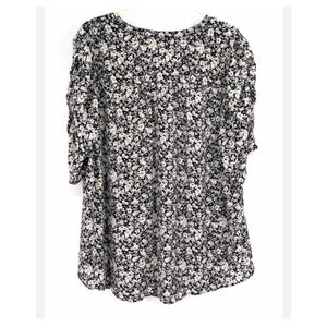 Torrid Harper Black and White Floral blouse.